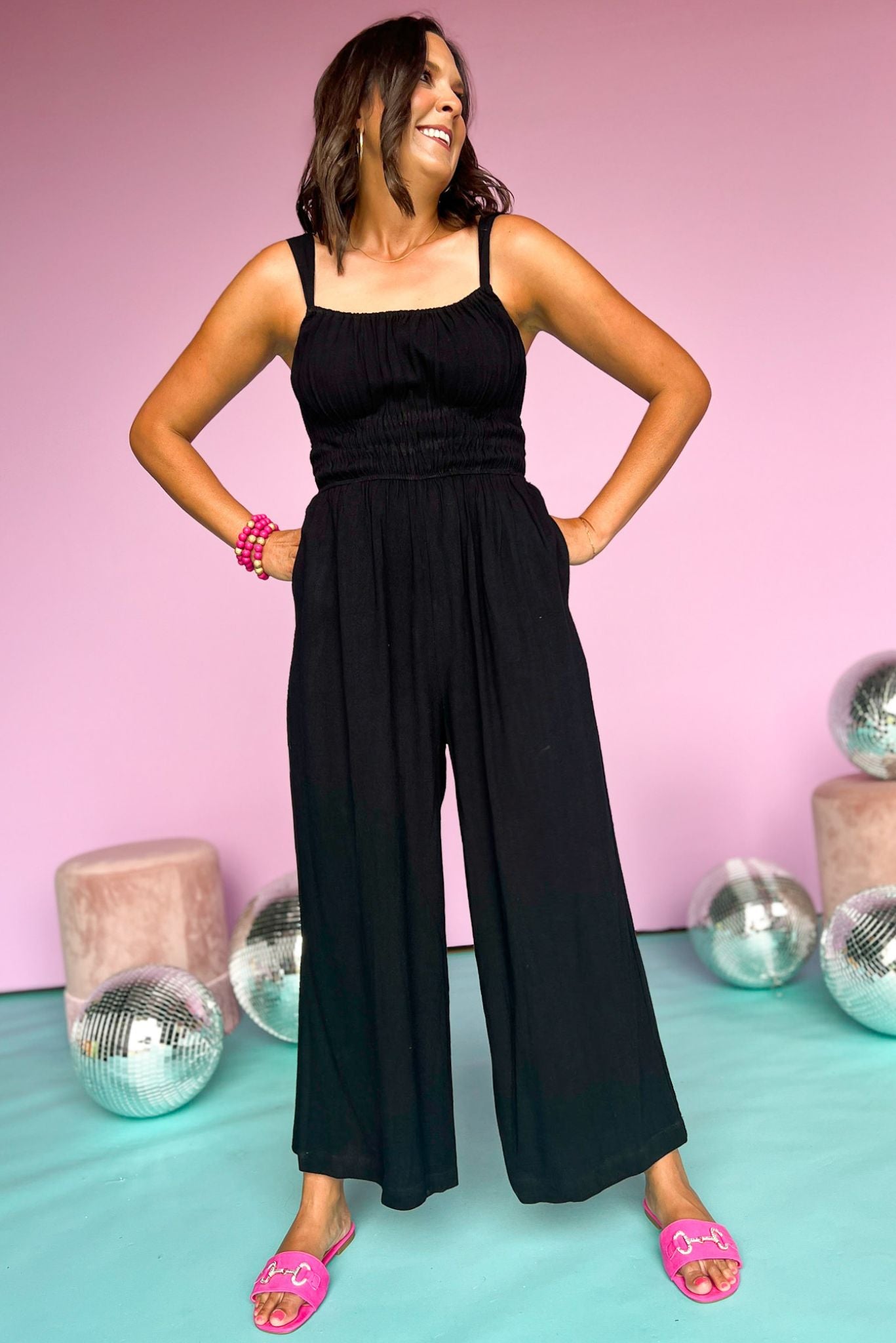 Load image into Gallery viewer, black smocked waisted adjustable cami strap wide leg jumpsuit, summer style, mom style, easy to wear, comfortable, chic outfit, put together, shop style your senses by mallory fitzsimmons
