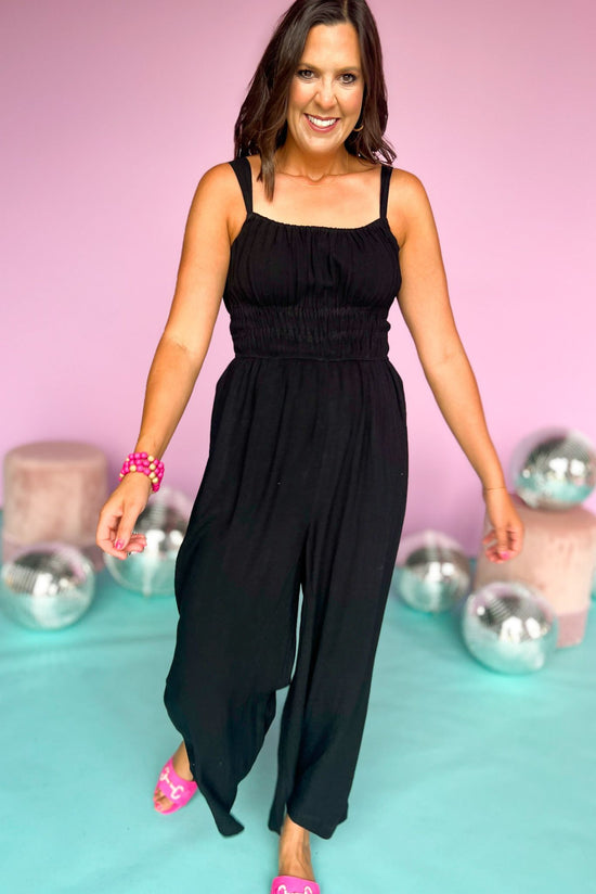 Load image into Gallery viewer, black smocked waisted adjustable cami strap wide leg jumpsuit, summer style, mom style, easy to wear, comfortable, chic outfit, put together, shop style your senses by mallory fitzsimmons
