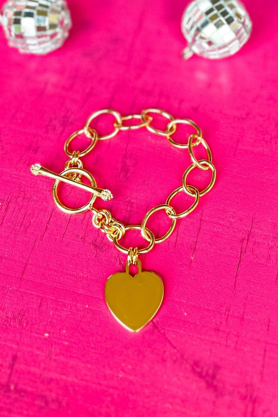 Load image into Gallery viewer, gold Metal Heart Lock Charm Toggle Bracelet, charm, heart charm, toggle bracelet, everyday wear, shop style your senses by mallory fitzsimmons
