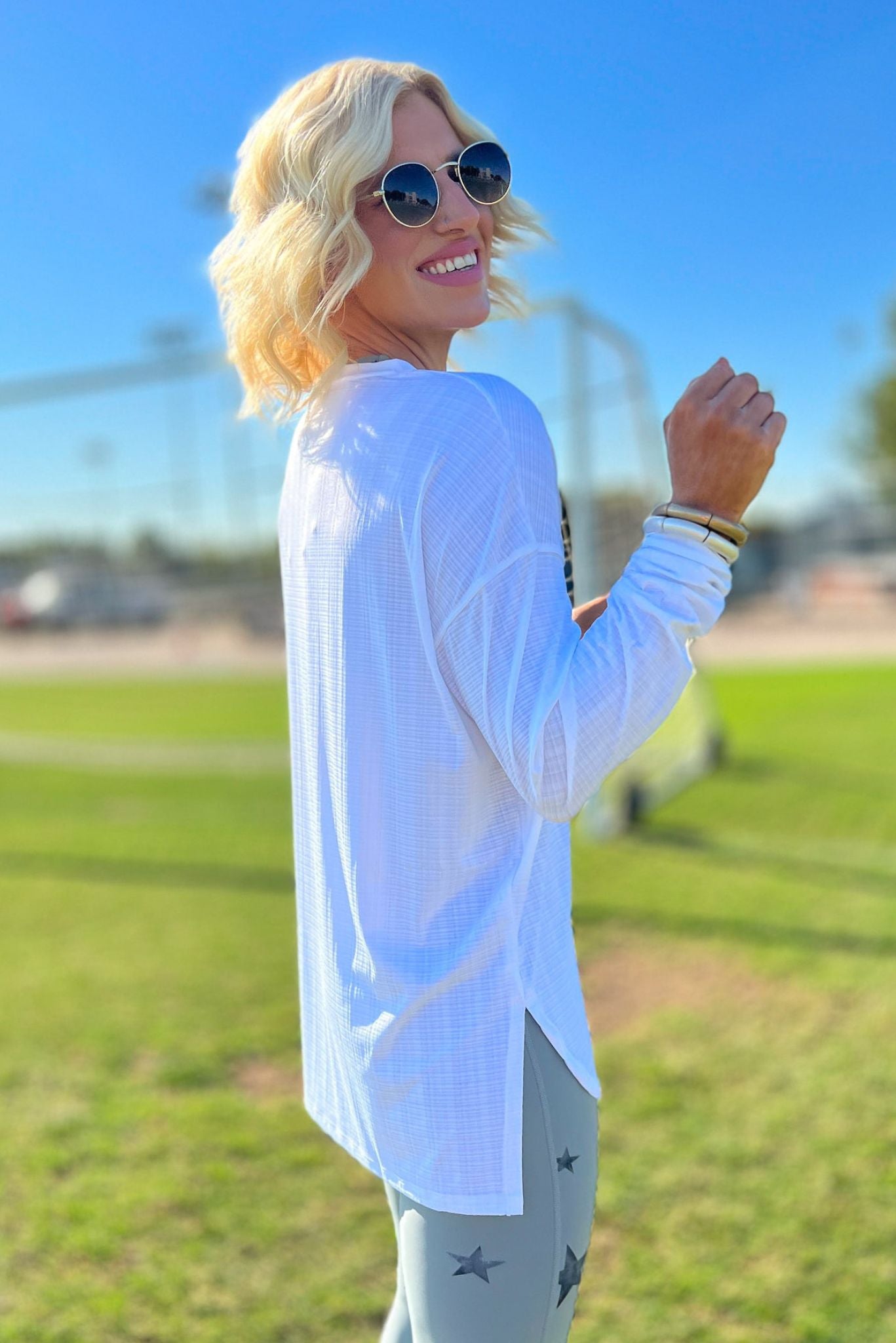 White Textured Side Slits Long Sleeve Top, long sleeve, white long sleeve, work out outfit, lounge wear, athleisure, leggings, matching set, shop style your senses by mallory fitzsimmons