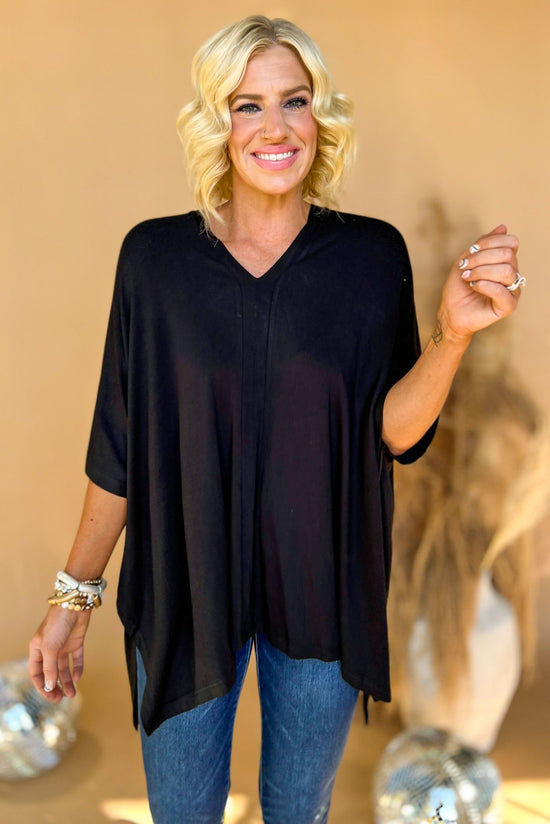 black v neck poncho top, medium wash skinny jeans, easy to wear, fall trends, shop style your senses by mallory fitzsimmons