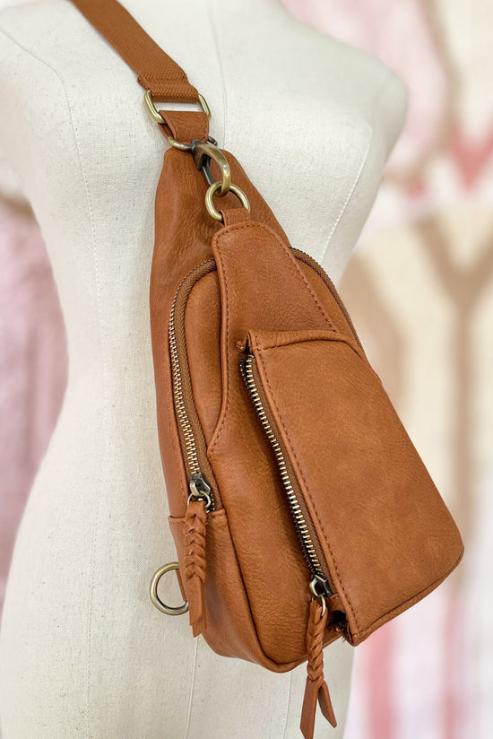 Load image into Gallery viewer, Tan Faux Leather Double Zip Sling Bag, fall fashion, travel bag, over night bag, must have, mom style, shop style your senses by mallory fitzsimmons
