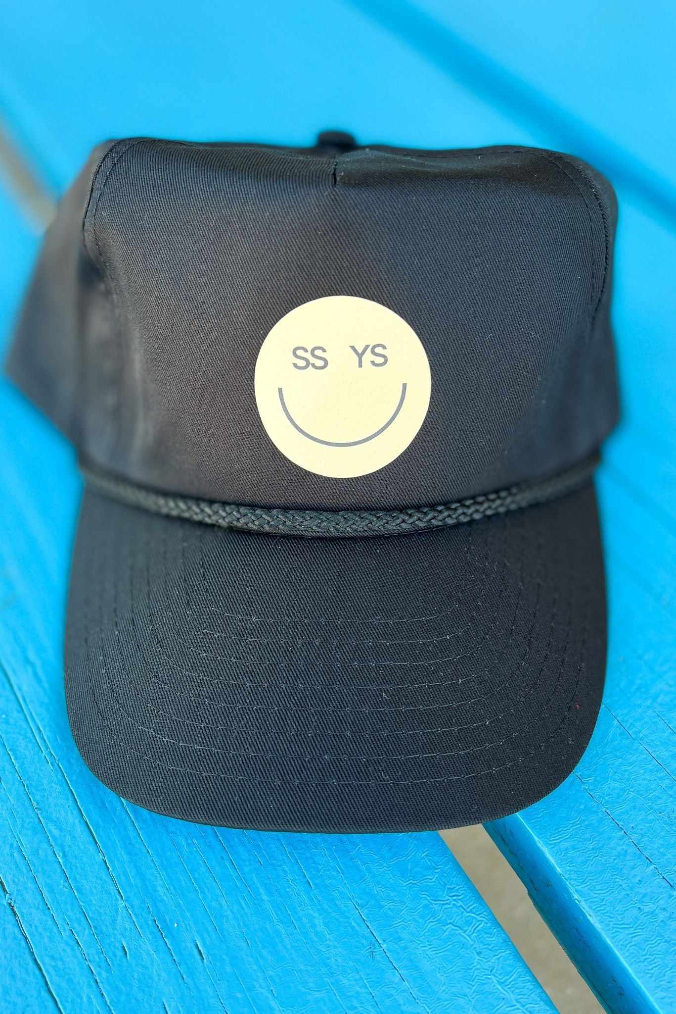 Load image into Gallery viewer, black SSYS Smiley Trucker Hat, must have, custom piece, trucker hat, everday wear, fall fashion, mom style, shop style your senses by mallory fitzsimmons
