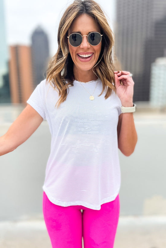 white sheer striped athleisure top with back panel, June athleisure collection, comfy style, gym fashion, workout wear, shop style your senses by mallory fitzsimmons