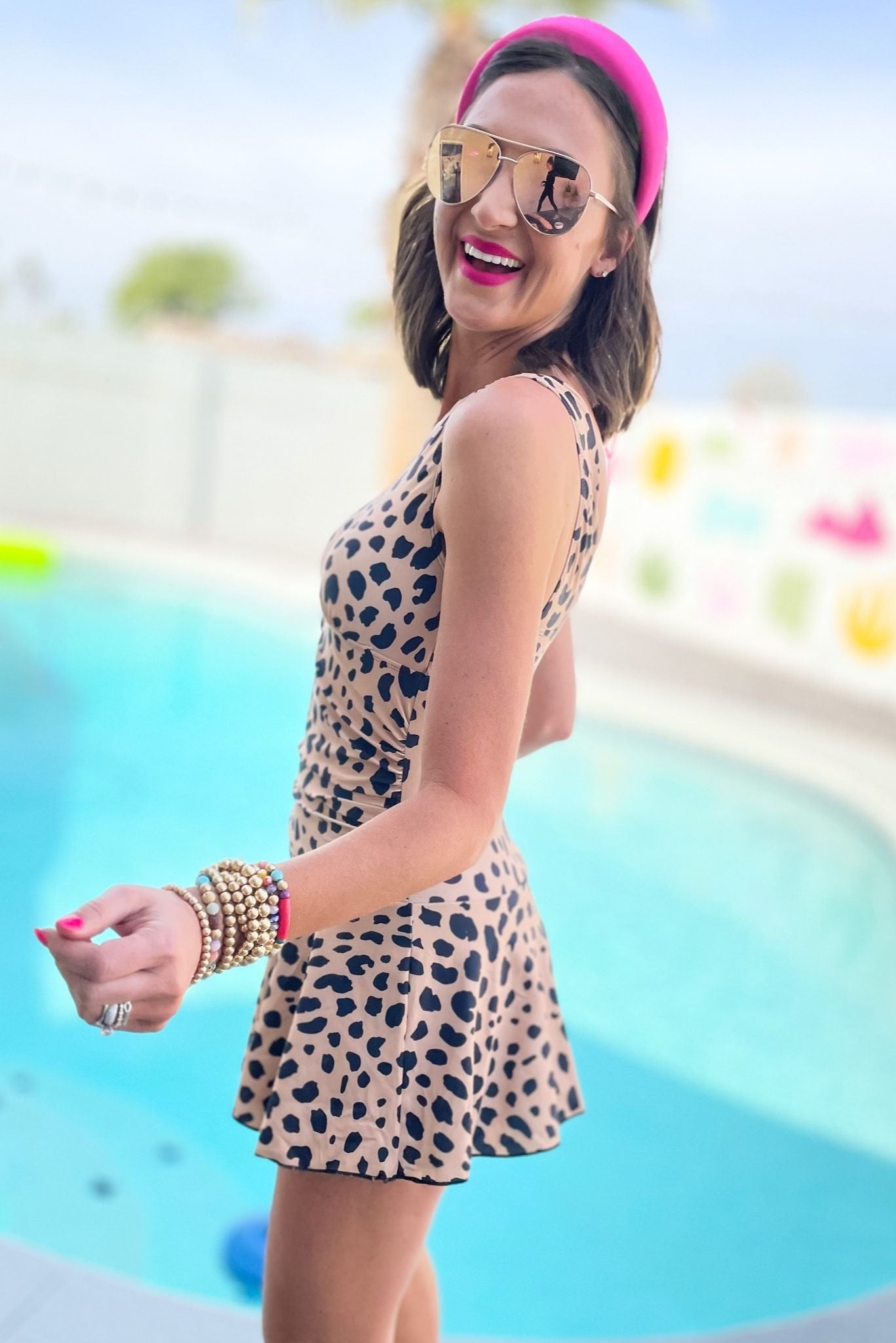 Load image into Gallery viewer, Brown Animal Print V Neck Skort One Piece Swimsuit, animal print, skirt, swim skirt, animal print one piece, swim suit, shop style your senses by mallory fitzsimmons

