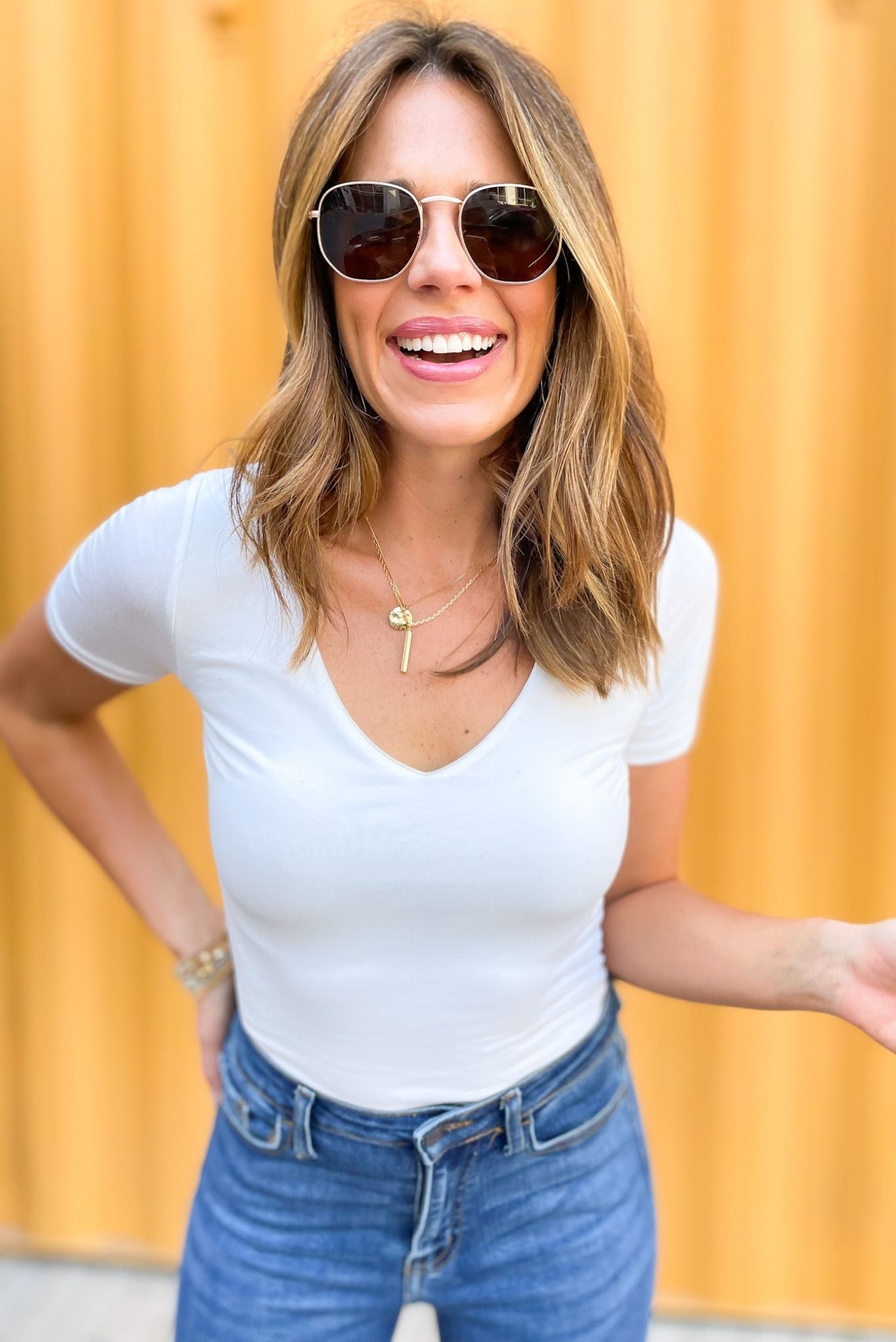 ivory double layered short sleeve v neck top, medium wash flare denim, closet staples, layering pieces, date night options, shop style your senses by mallory fitzsimmons