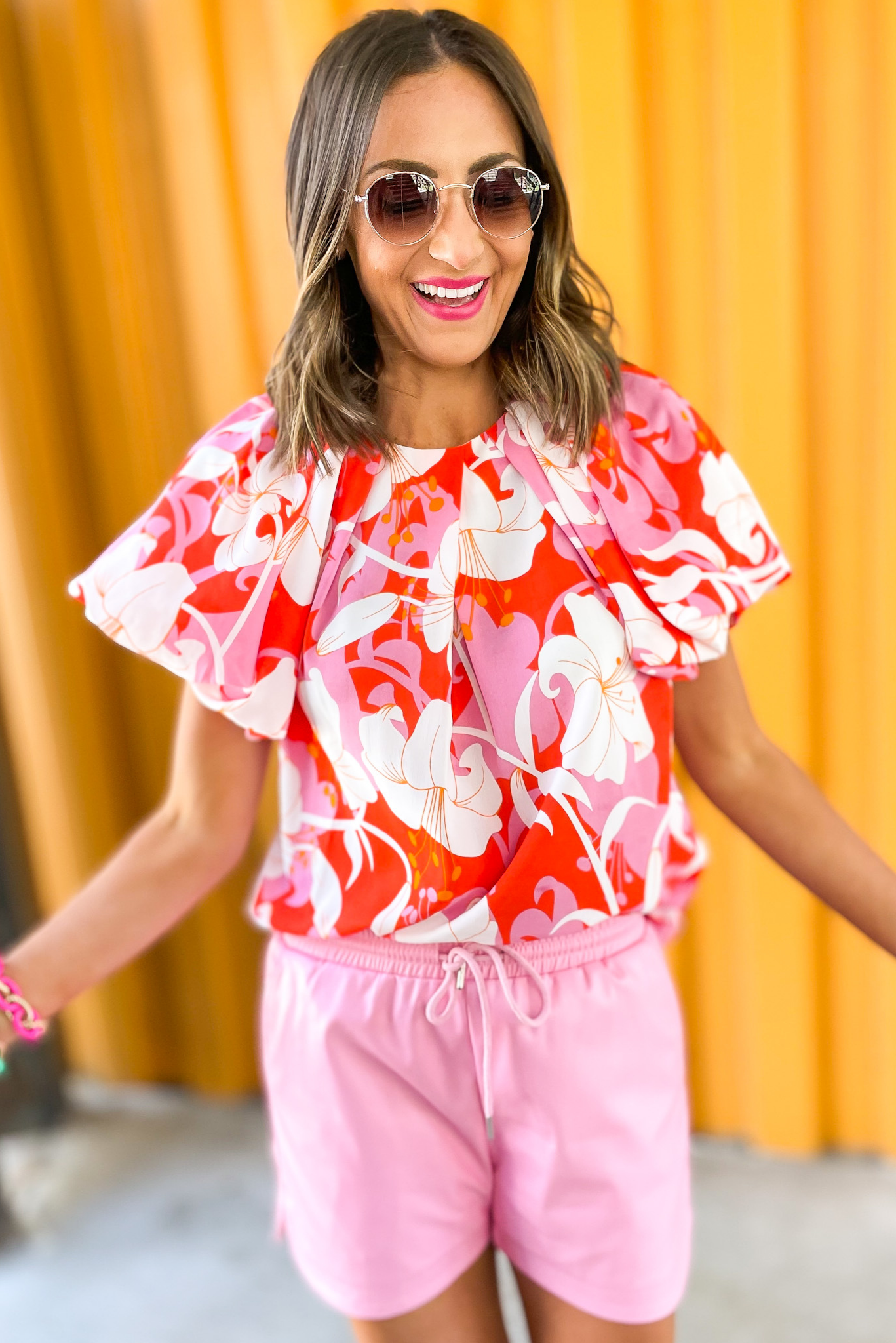 Load image into Gallery viewer, Orange Floral Print Pleated Bubble Sleeve Top, puff sleeve top, spring top, floral print, pleated, bubble sleeve top, shop style your senses by mallory fitzsimmons
