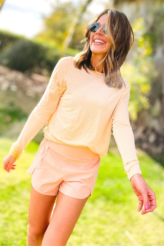 Apricot Long Sleeve Ribbed Topw/ cut out back, athleisure, work out outfits, fitness, spring work out, key hole top, trellis, shop style your senses by mallory fitzsimmons